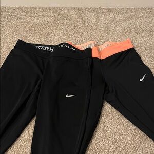Nike Kids Black Leggings with Orange Waistband